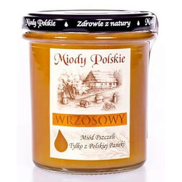 Heidehonig von Miody Polskie in einem Glas mit rotbrauner Farbe und feinkörniger Konsistenz