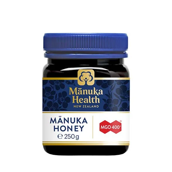 Manuka-Honig MGO 400+ aus Neuseeland in einem Glas, zeigt seine goldene Farbe und die natürliche Konsistenz